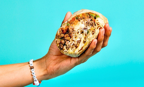 Pronto Taco burrito catering setup with individually wrapped burritos ready for delivery