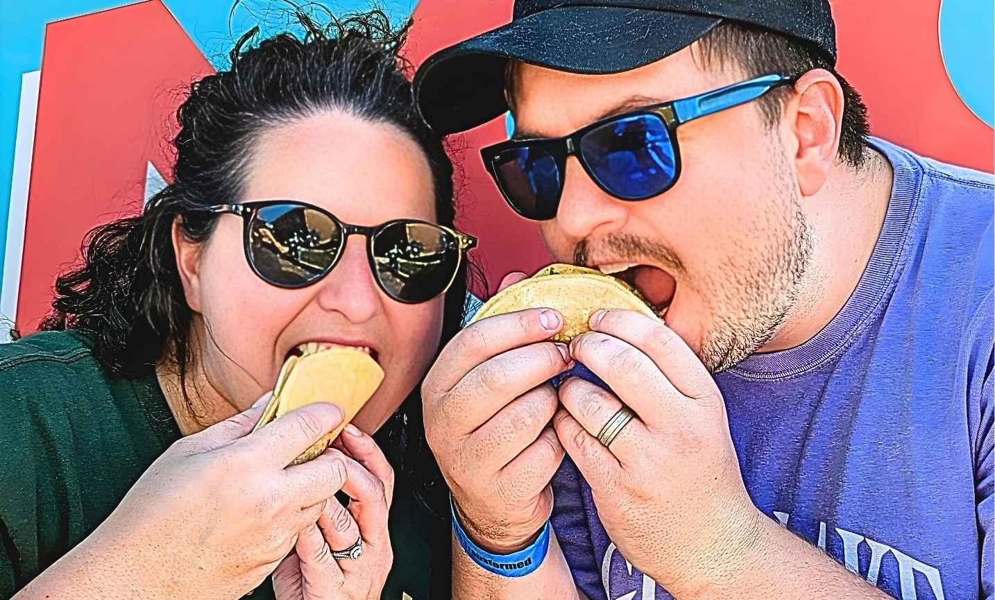 Guests enjoying tacos at a taco bar catering setup