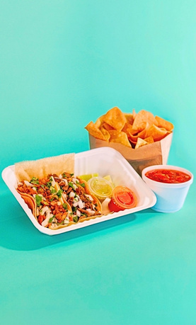 Pronto Combo packed for carry-out with two tacos, chips, and salsa