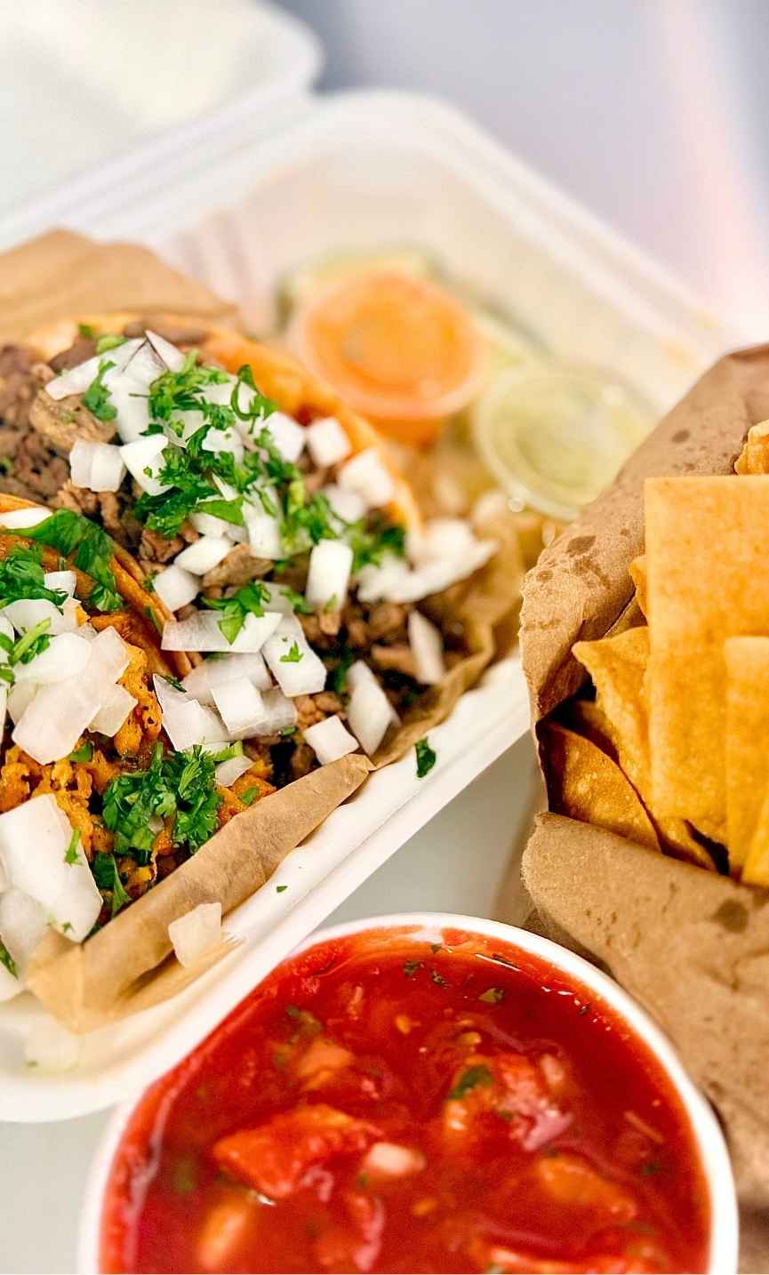 Pronto Combo packed for carry-out with two tacos, chips, and salsa