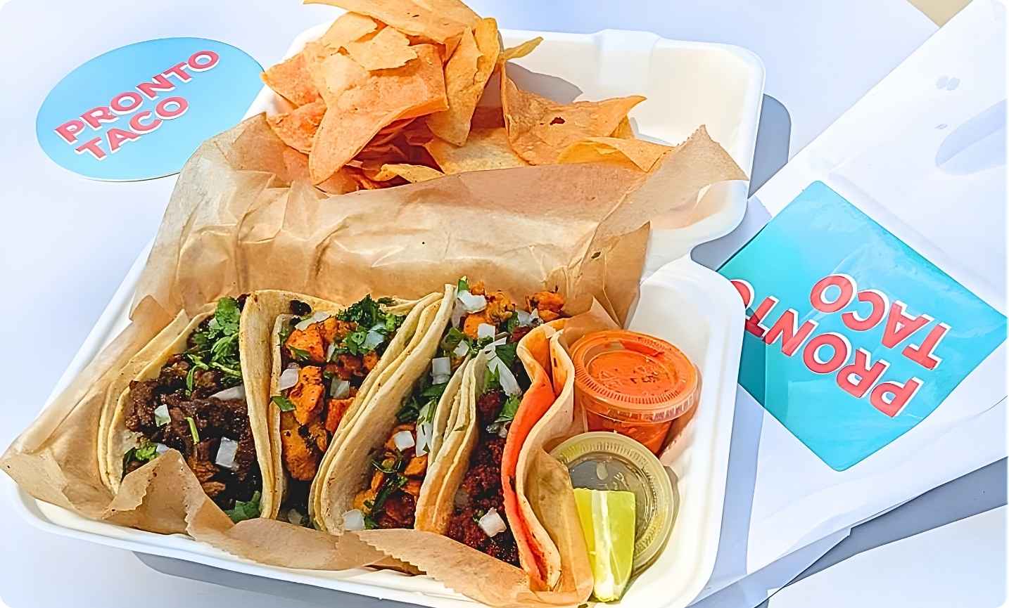 Takeaway taco boxes lined up for a graduation party